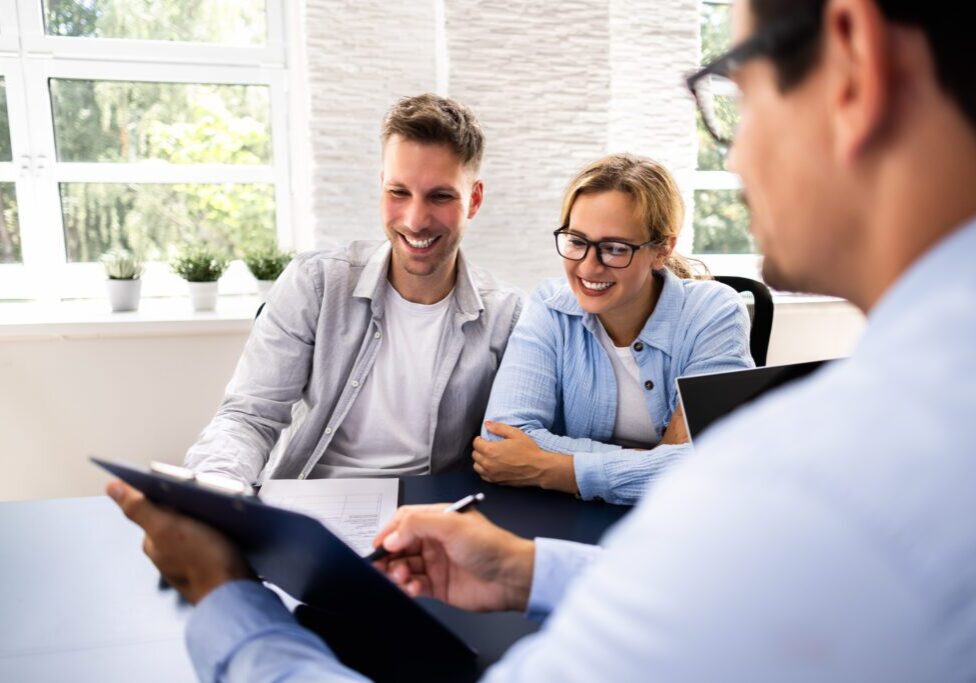 Two professionals engaged in a positive business meeting.